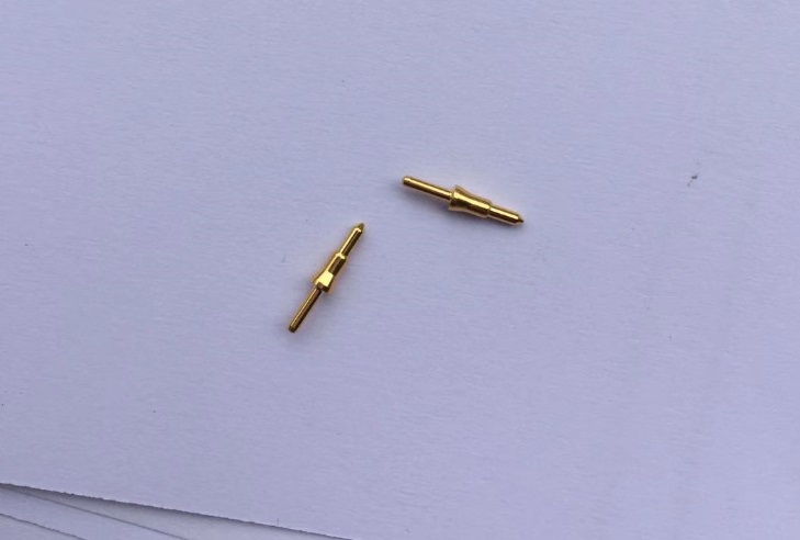 Sharp spring loaded pin